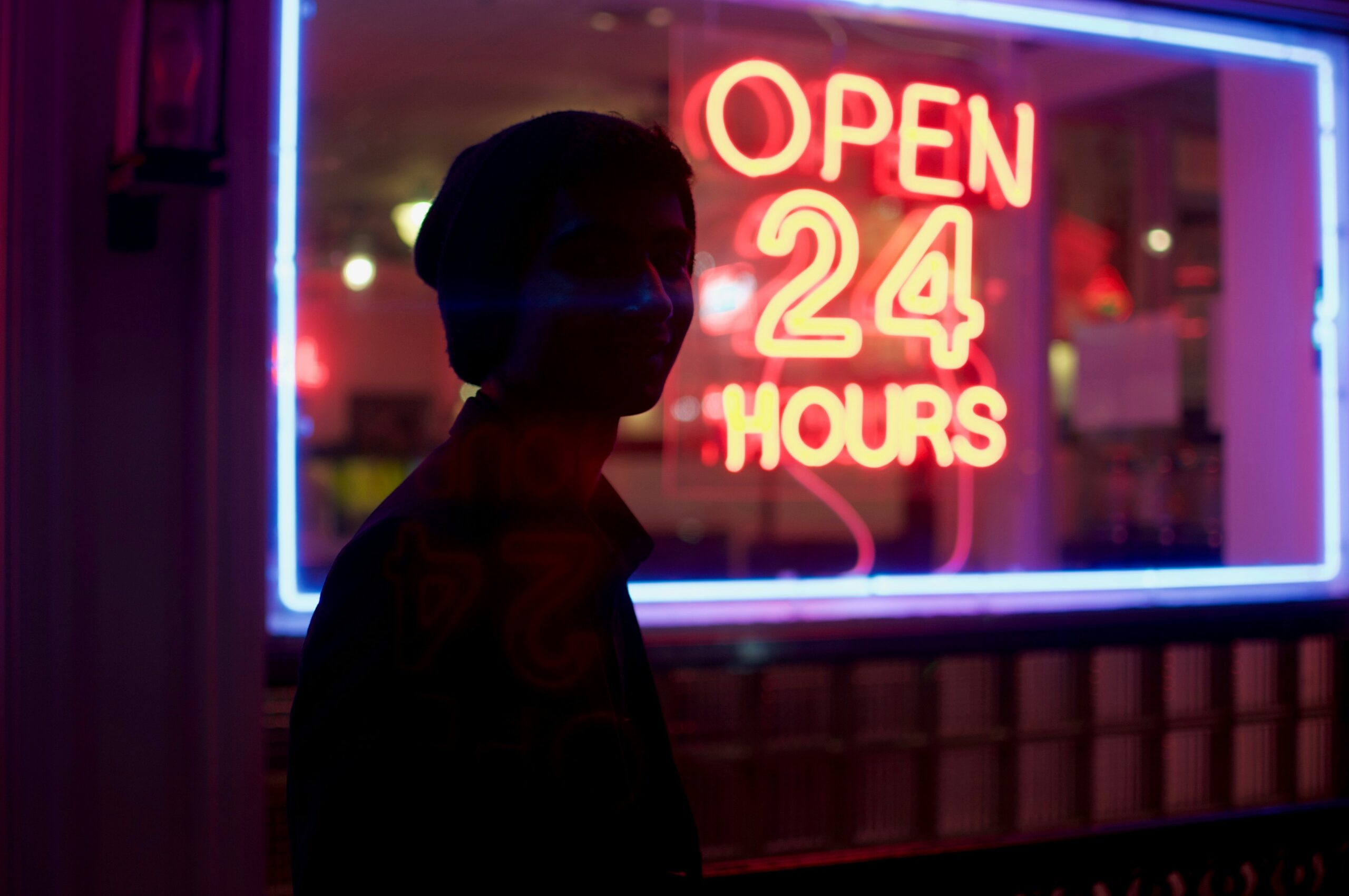 An employee working late hours without receiving overtime pay